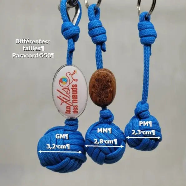 porte clés pomme de touline personnalisable paracord 550 bleu fabrication artisanale Origine Corrèze gravure laser doming aux fils des nœuds taille
